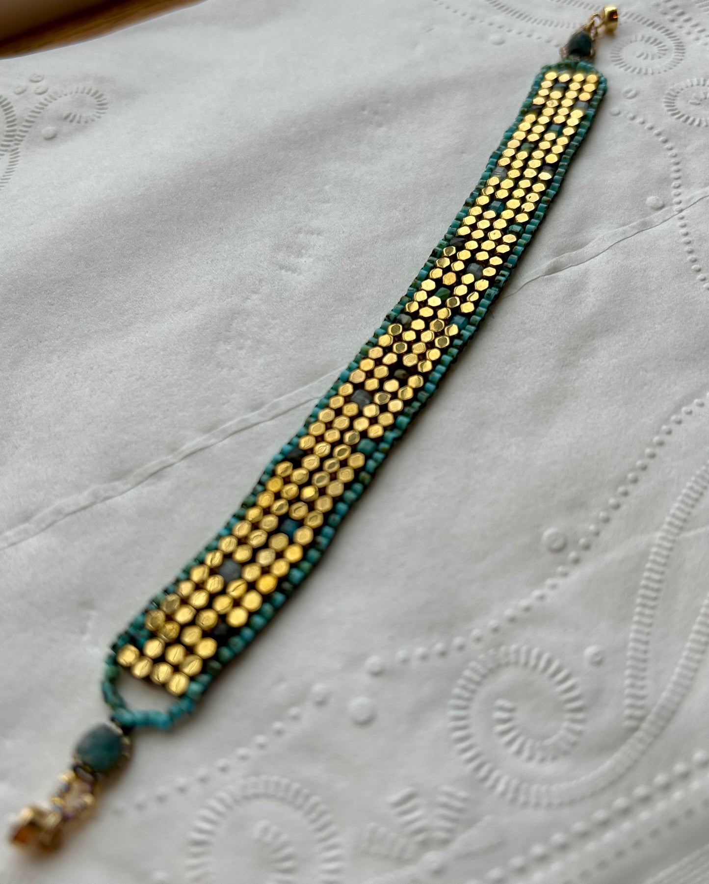 Brass and stone band